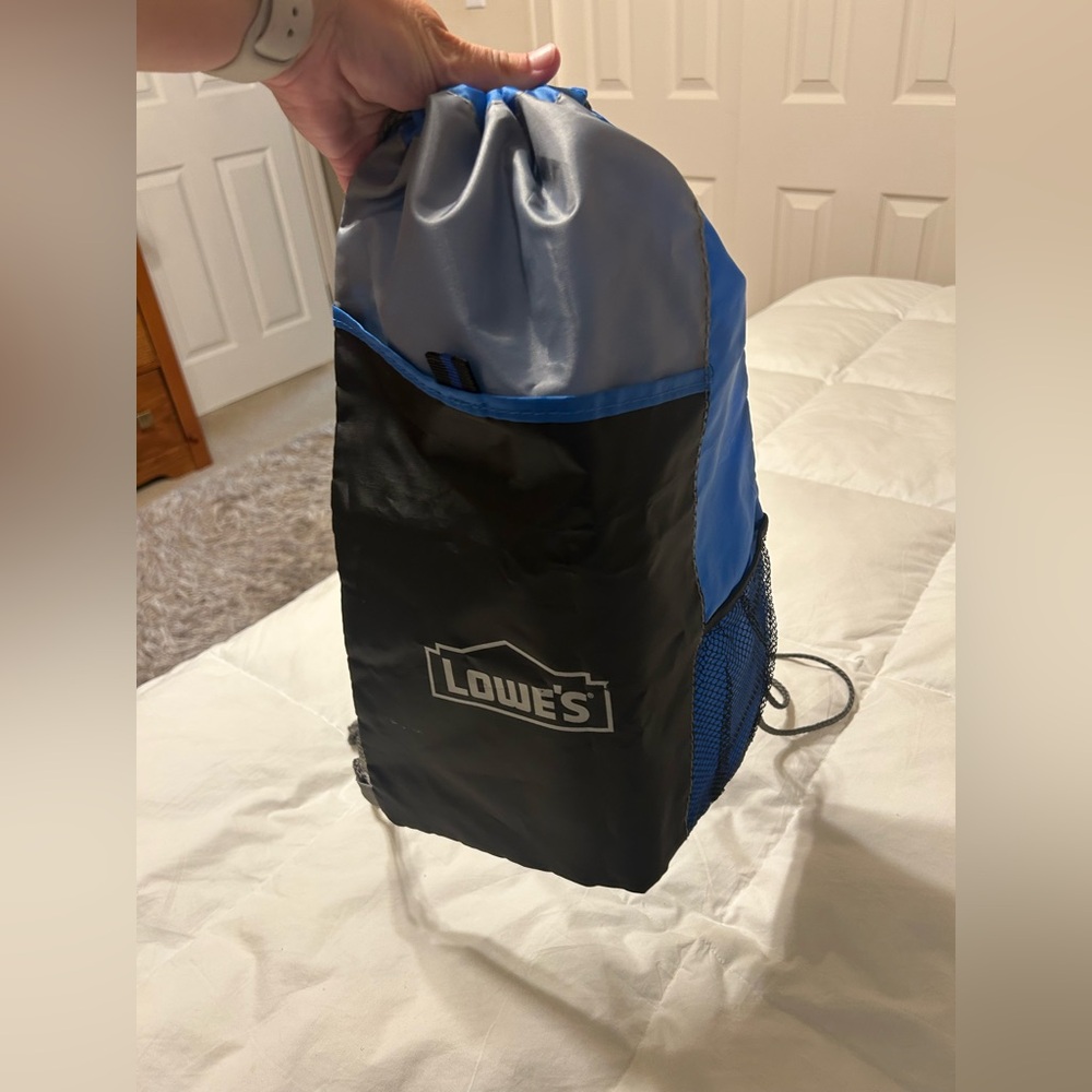 CROWN | Drawstring Backpack Bag w/multiple front products made for Lowe’s